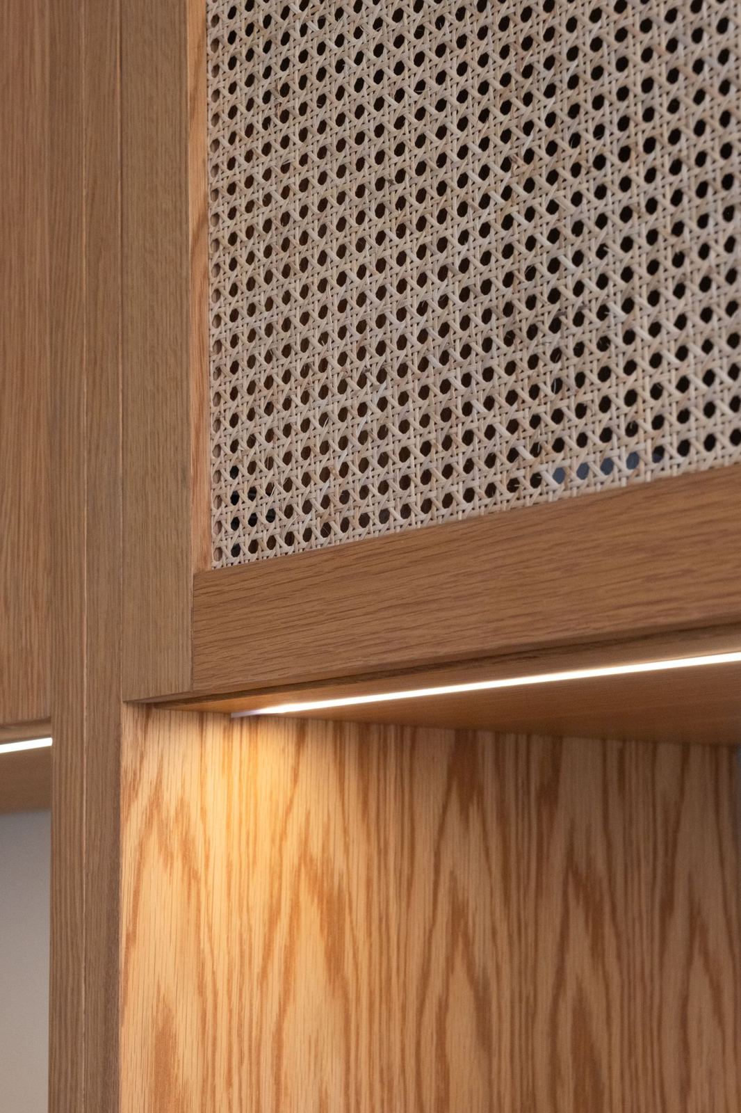 Oak frame with cane panel and hidden LED strip