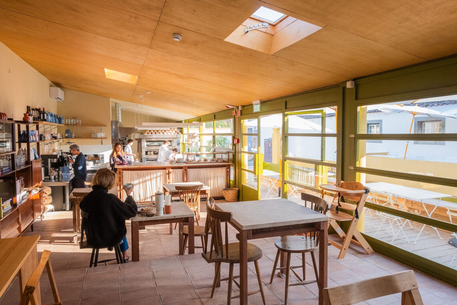 DOMA dining room under the plywood ceiling