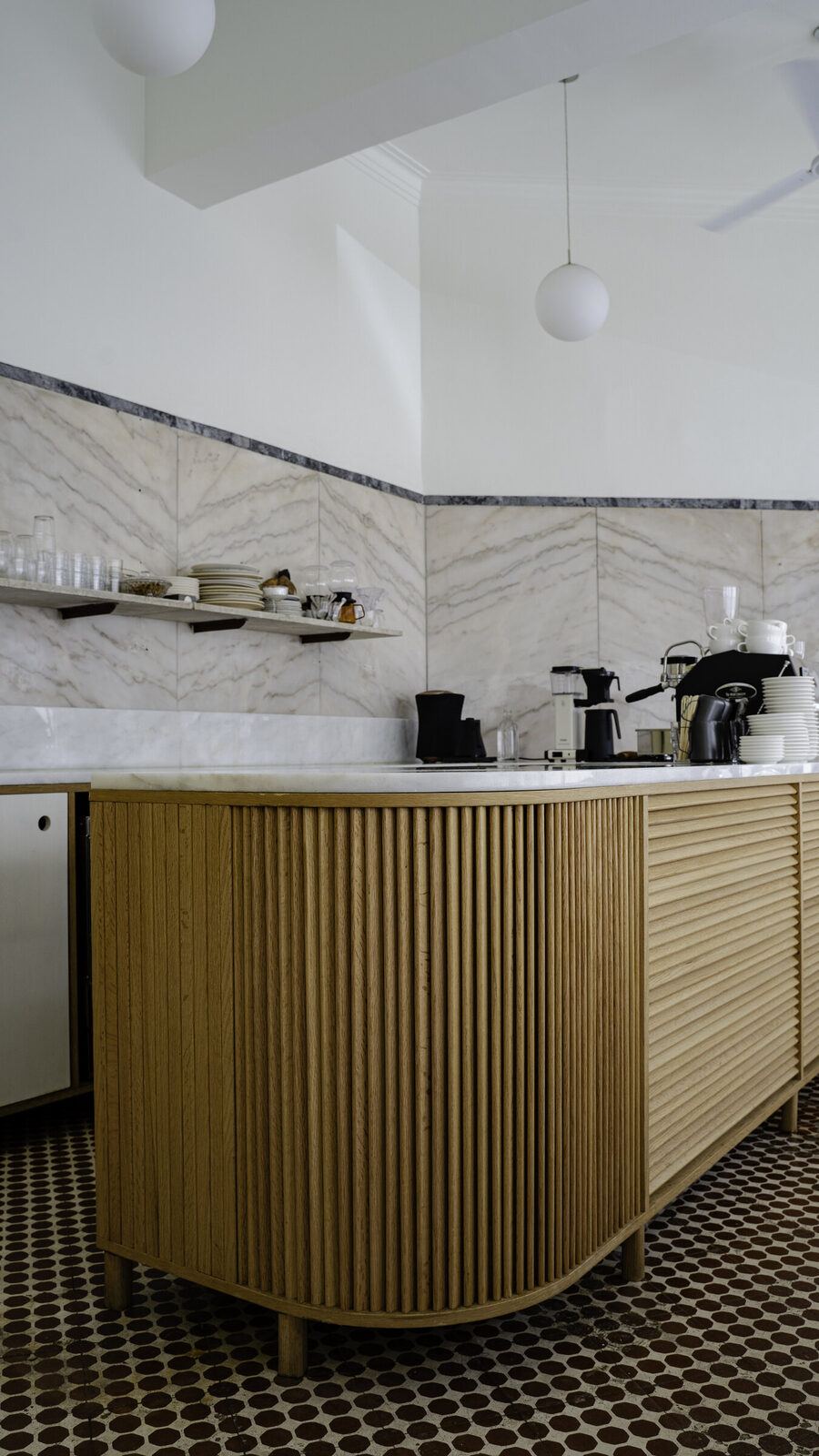 Curved oak counter with fluted slats, TACT