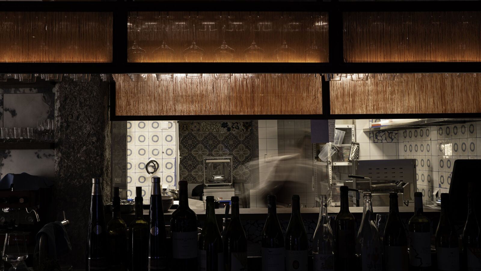 Lit oak panels over the open kitchen, Parra