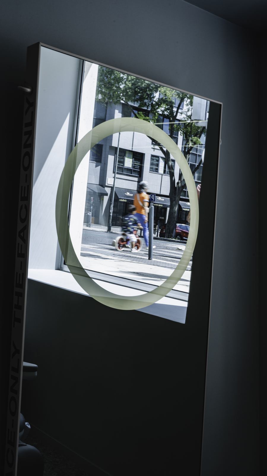 Backlit mirror by the window