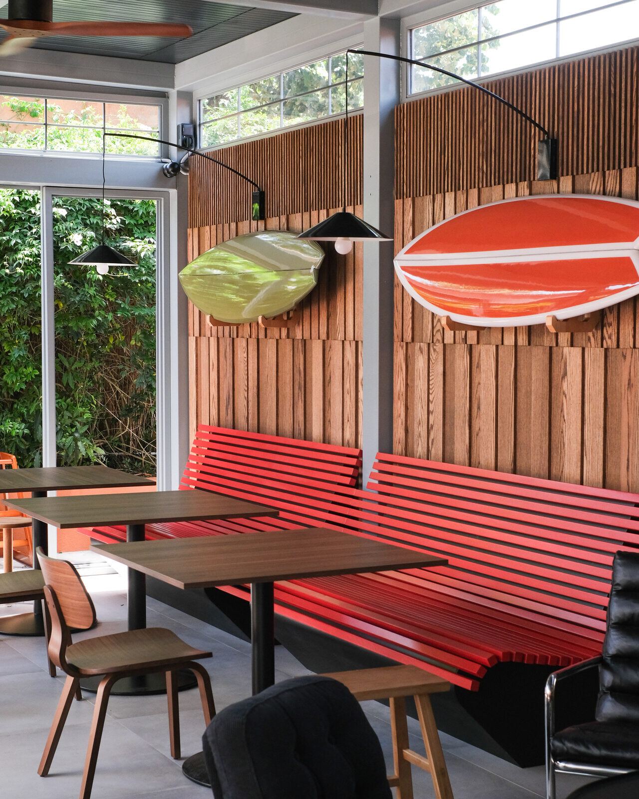 ULU cafe, Cascais: red slatted bench bent into its backrest